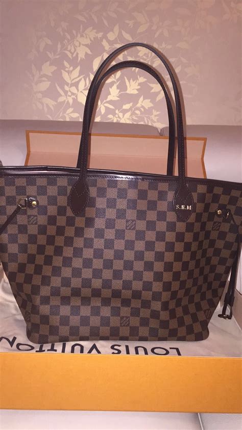 decal louis vuitton|Louis Vuitton bag with initials.